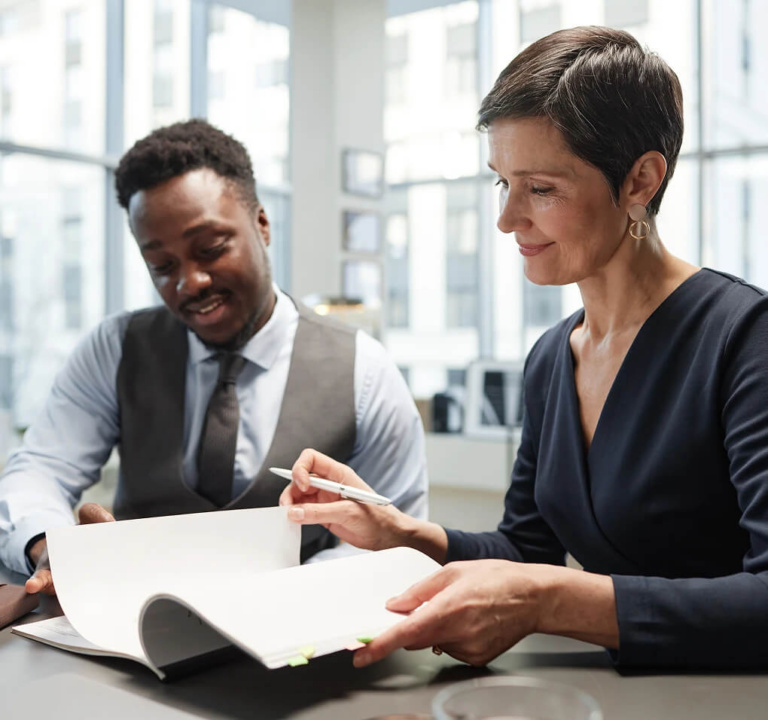 Two Professionals Reviewing Documents