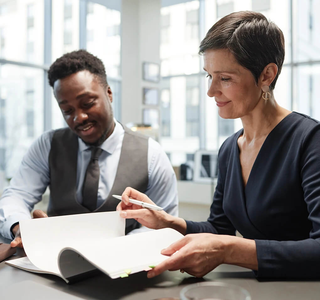Two Professionals Reviewing Documents